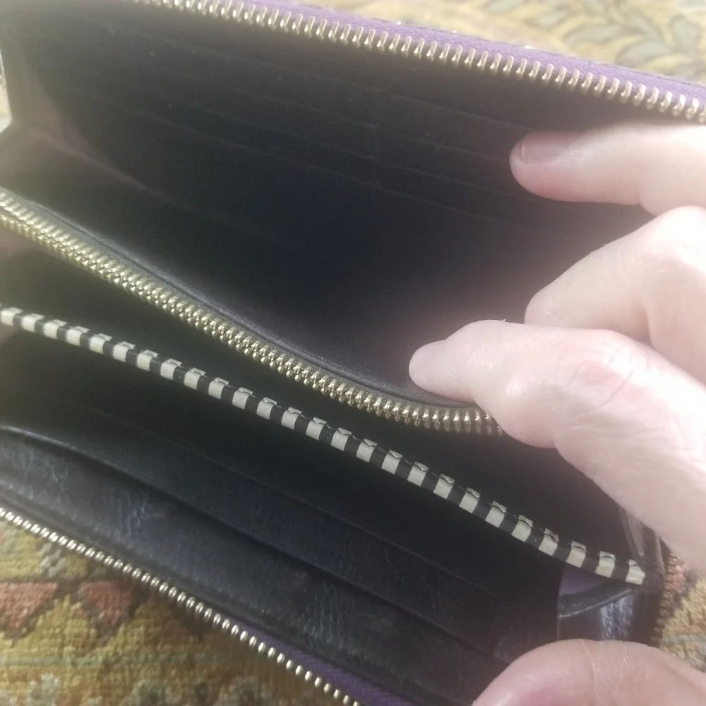 Henri Bendel purple snakeskin embossed leather wallet